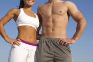 close up of fit waist couple as weight loss and fitness concept